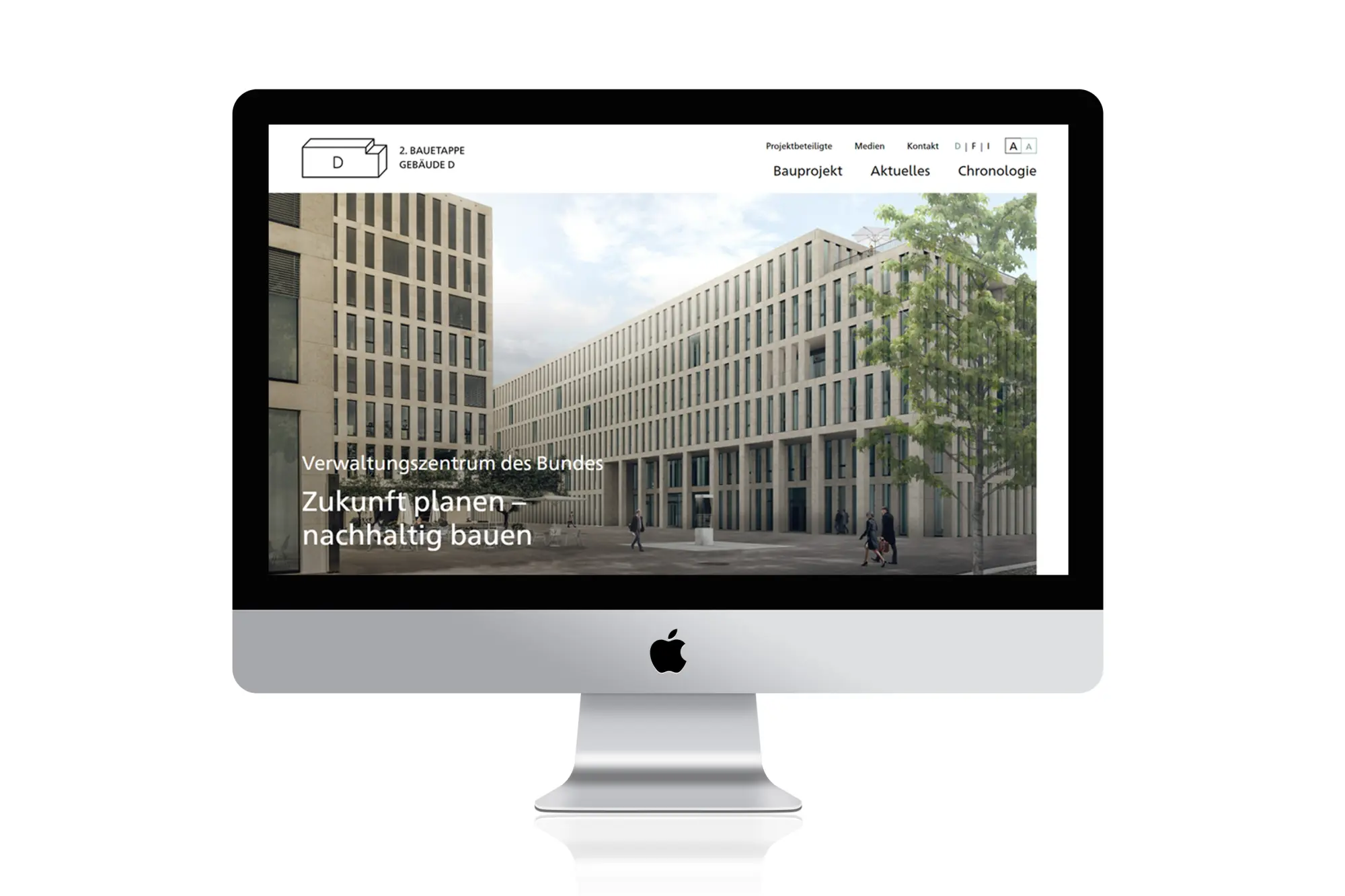 Website-Startseite des Projekts 'Gebäude D, 2. Bauetappe' des Verwaltungszentrums des Bundes, dargestellt auf iMac-Bildschirm.